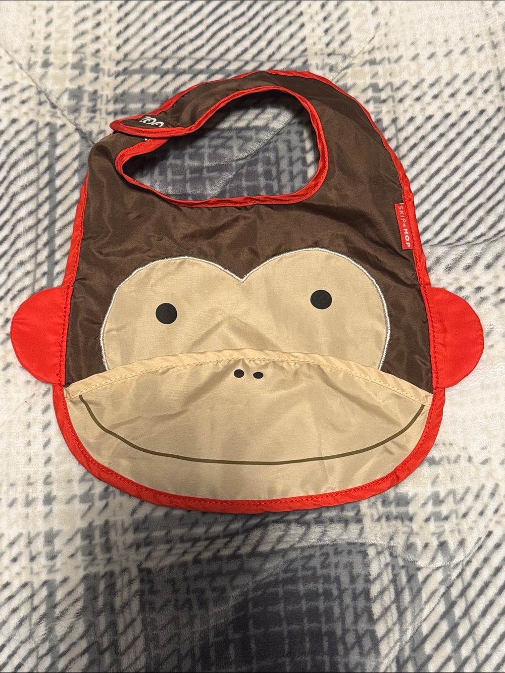 Skip Hop Monkey Bib in Brown, Cream & Red Trim